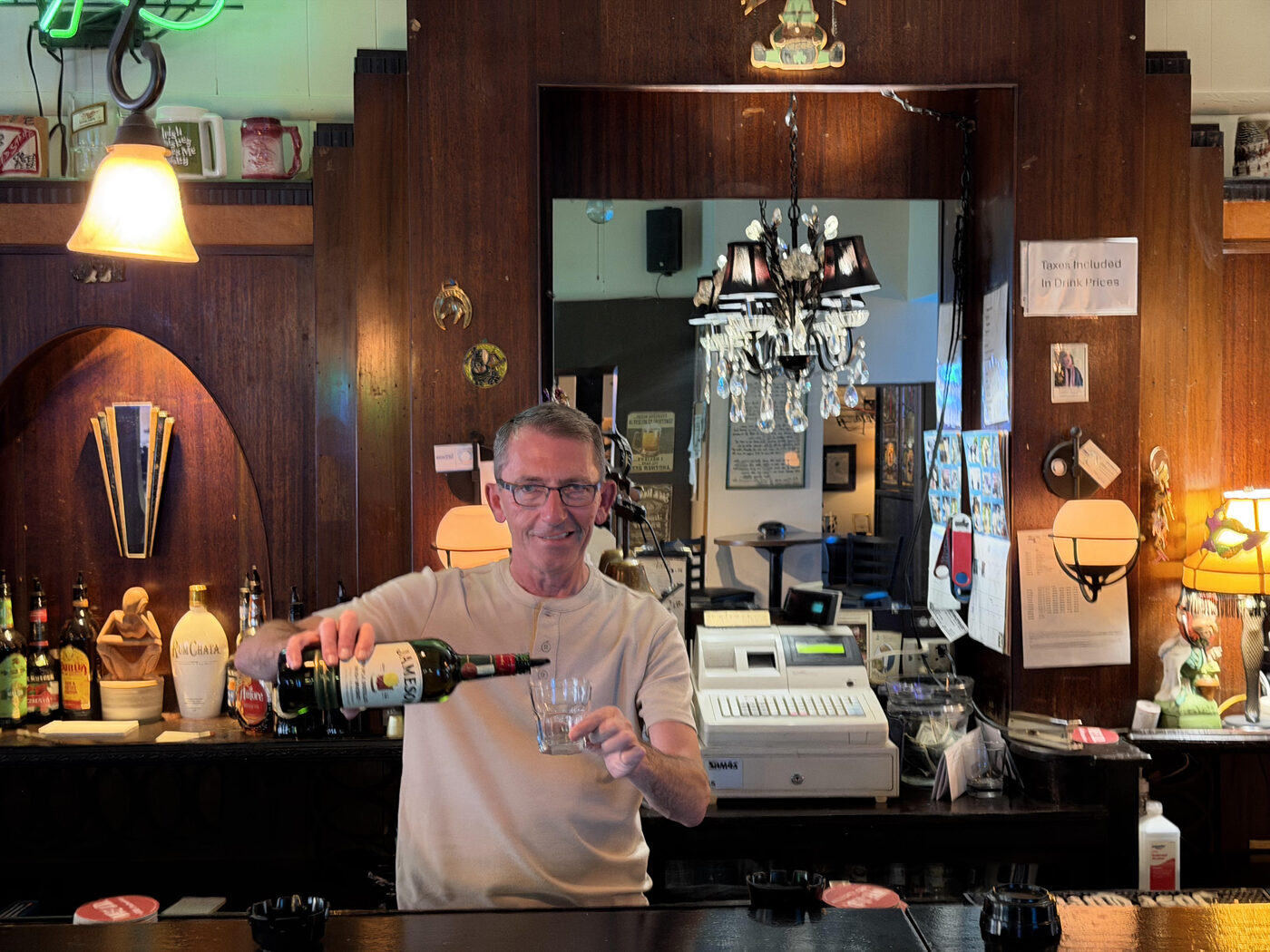Whalen's bartender pouring a Jameson behind the bar
